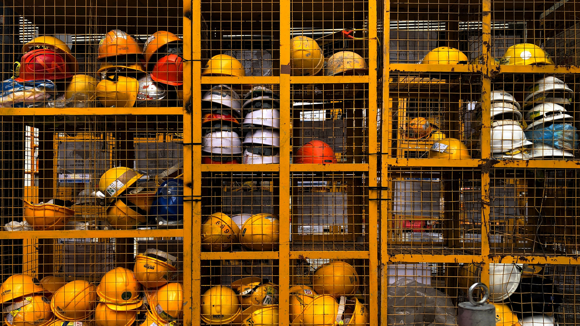 lockers filled with construction helmets